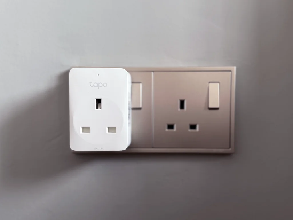 Tapo P110M plugged into wall socket