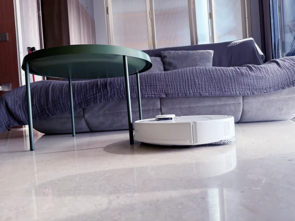 Roborock Qrevo C Pro bumps into skinny coffee table leg