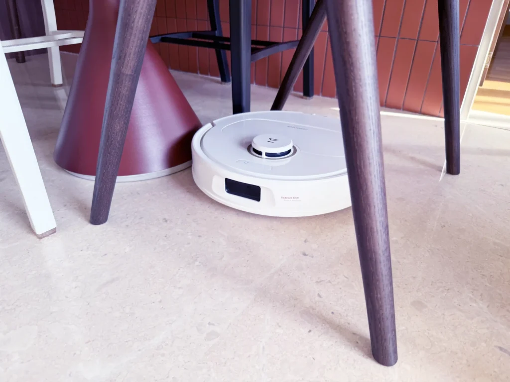 Roborock Qrevo C Pro navigating around chair legs