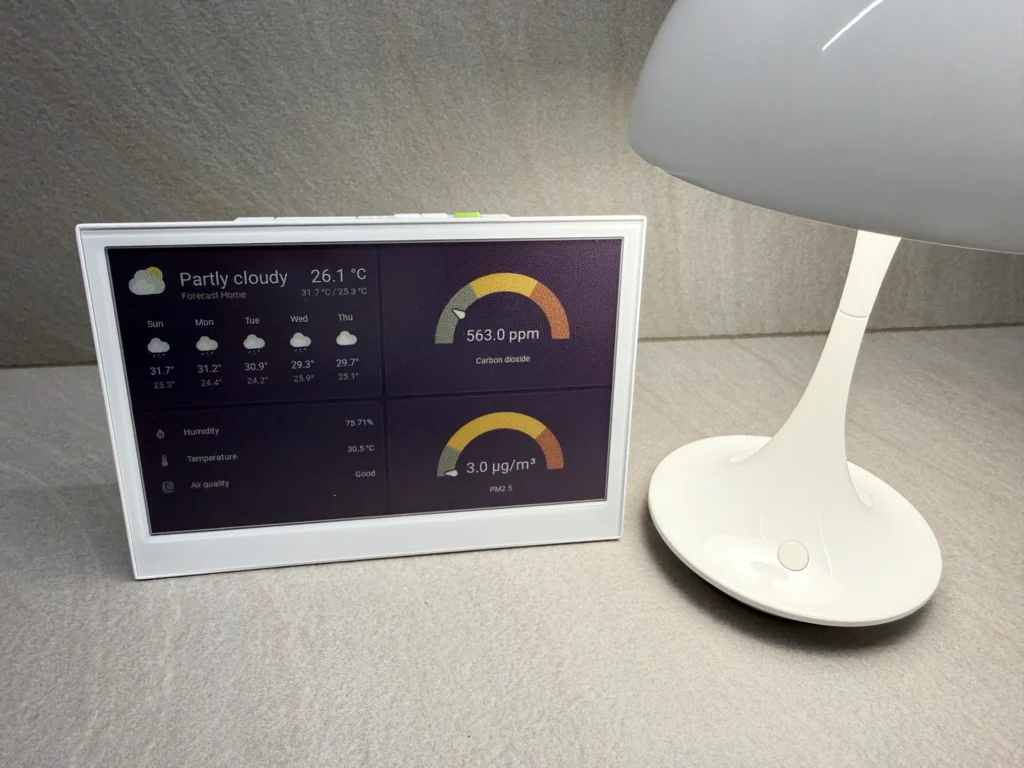 Seeed Studio reTerminal E1002 ePaper display with Home Assistant dashboard generated by Puppet